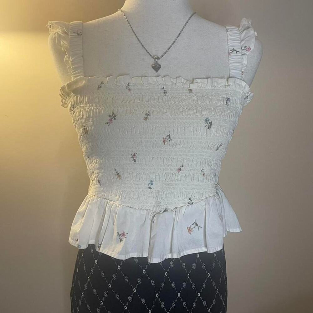 White ruffled tank top